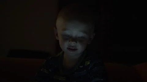 Boy Darkness Tablet - 4k Stock Footage 58804450