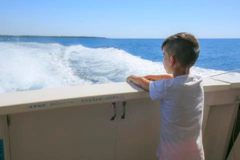 Boy in a deck of a cruise Foto stock