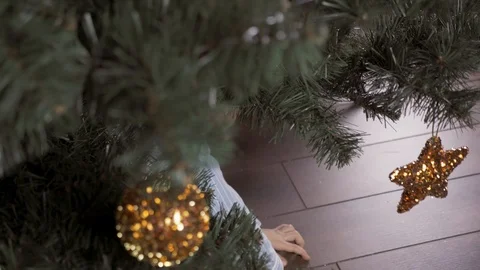Boy decorate a Christmas tree Stock Footage 113753798