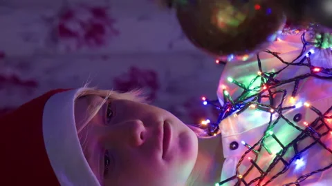 Boy decorating Christmas tree at home Stock Footage 219461745