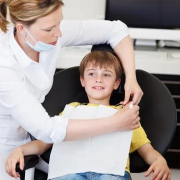 Boy at dentist Stock Photos