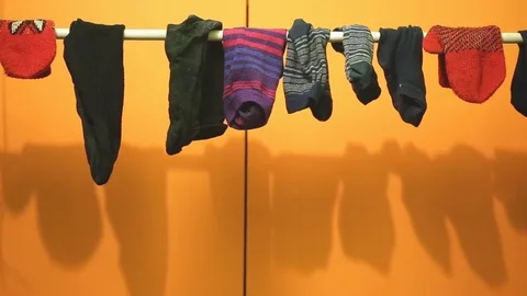 The boy at the desk writes in a notebook Stock Footage 74232572