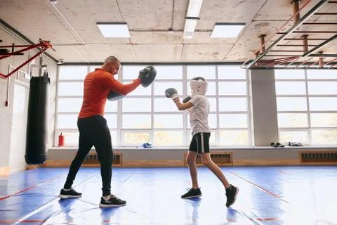 Boy developing striking skills, strength training Stock-Fotos