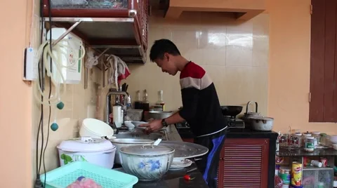 Boy dishwashers Video stock 45919925