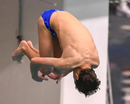 Boy divers competing at a diving meet at a competition in South Texas Stock Photos