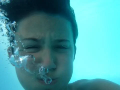 Boy diving Stock Photos