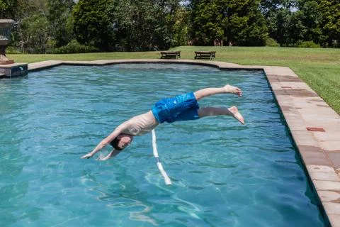 Boy Diving Swimming Pool Stock Photos