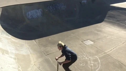 Boy Does Wall Trick With Scooter at Skate Park 스톡 동영상 81338019