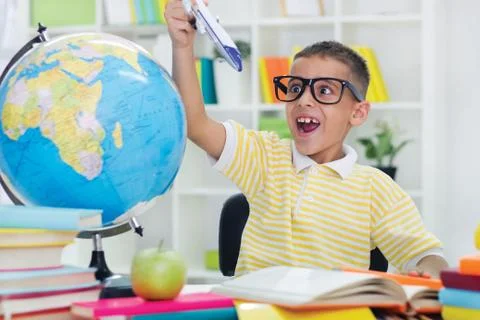 Boy doesn't like to study Stock Photos