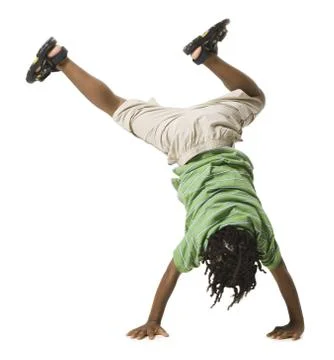 Boy doing a cartwheel Stock Photos