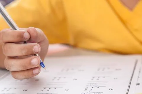 Boy doing the exam 写真素材