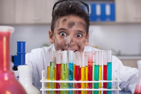Boy doing experiments in the laboratory,Science and education concept Stock Photos