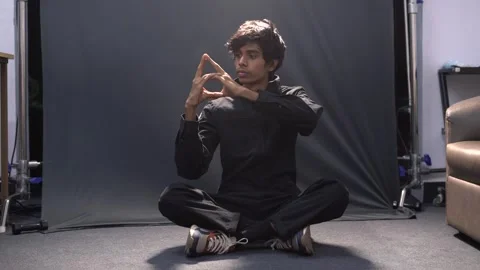 The boy is doing a hand moves . popping and locking dance Stock Footage 158725654