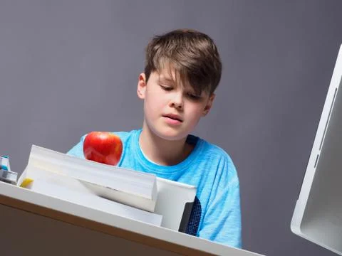 Boy doing his homework Stock Photos
