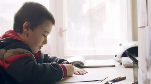 Boy Doing Homework Stock-Footage 43340344