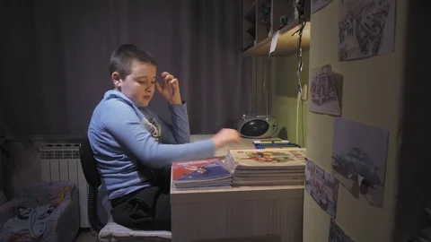 Boy doing homework 스톡 동영상 73206265