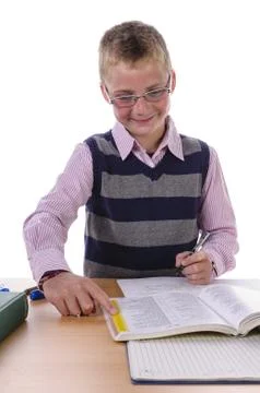Boy doing homework Stock Photos