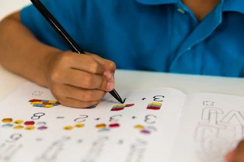 Boy doing homework Stock Photos