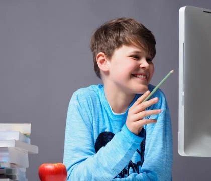 Boy doing homework Stock Photos