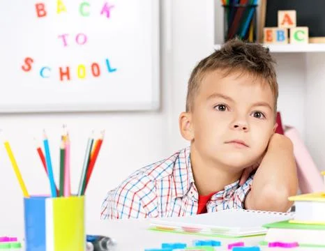 Boy doing homework Stock Photos