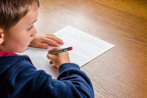 Boy doing homework Stock Photos