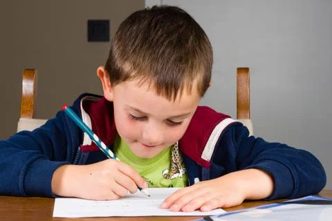 Boy doing homework Stock Photos