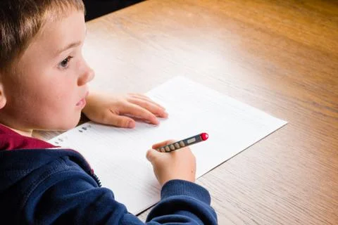 Boy doing homework Stock Photos