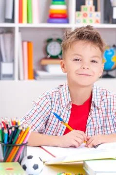 Boy doing homework Stock Photos