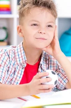 Boy doing homework Stock Photos