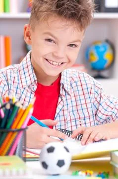 Boy doing homework Stock Photos