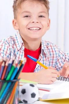 Boy doing homework Stock Photos