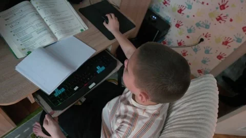 Boy Doing Homework in Room Study Computer Notebook School Stock Footage 309917074