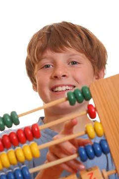 Boy doing maths Stock Photos