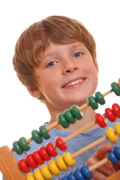 Boy doing maths Foto stock