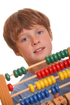 Boy doing maths Stock Photos