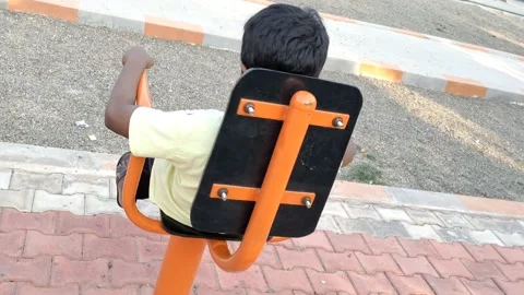 A boy is doing physical exercise with wellness machine - HD(4k video) 库存影片 232871648