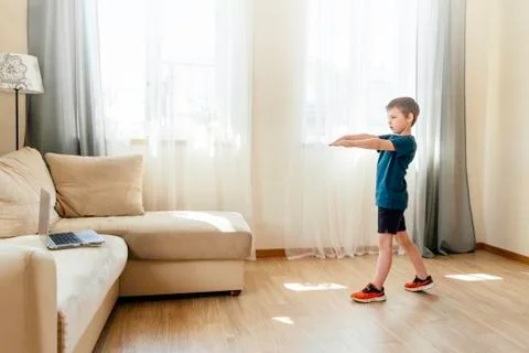 The boy doing physical exercises. Stock Photos