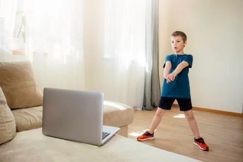 The boy doing physical exercises. Stock Photos