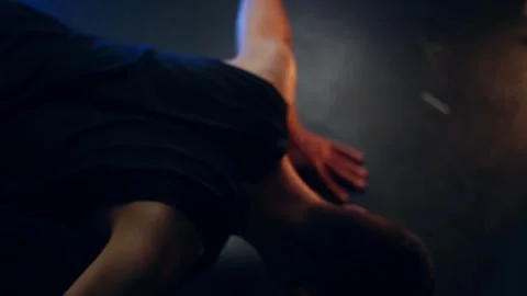 Boy doing push-ups on the floor Stock Footage 323762732