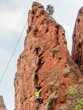 A boy doing rock climbing Stock Photos