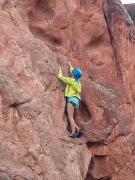 A boy doing rock climbing Stock Photos