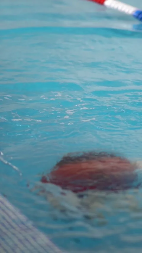 A boy doing somersaults underwater 스톡 동영상 310141248