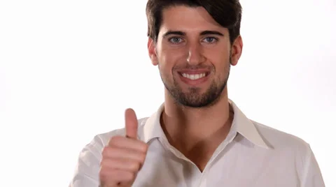A boy doing thumb-up sign over white background 스톡 동영상 33890688