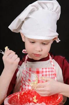 Boy with dough Stock Photos