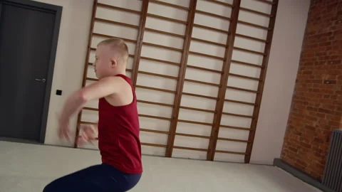 Boy with Down Syndrome Dancing in Bright Sports Class Stock Footage 326639587