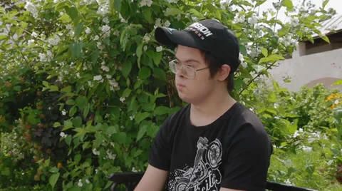 Boy  with Down syndrome Stock Footage 24770659