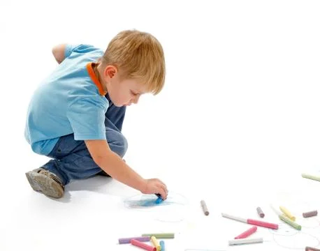 Boy Drawing with Chalk Stock Photos