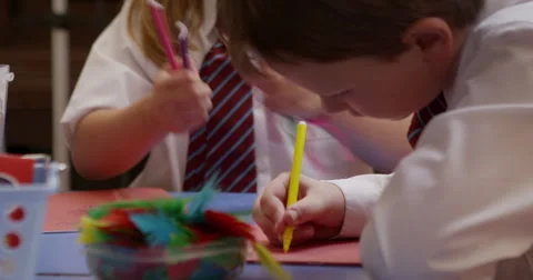 Boy drawing in classroom Stock Footage 58573090