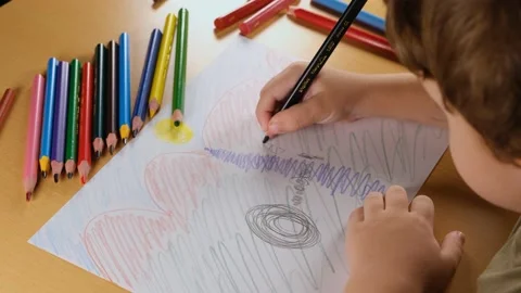 Boy drawing with pencil Stock Footage 222819872