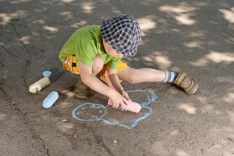 Boy drawing Stock Photos